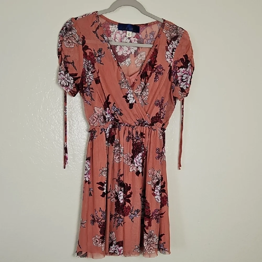 blue rain floral dress Wrap Flutter Sleeve Navy Blue Size Small NEW Cottagecore and an open back detail with adjustable back ties Blue Rain Floral Mini Dress
